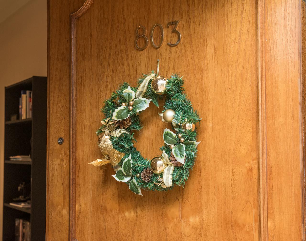 Roseville-CA-Christmas-wreath-hanging this image shows Christmas wreath hanging in Roseville, CA